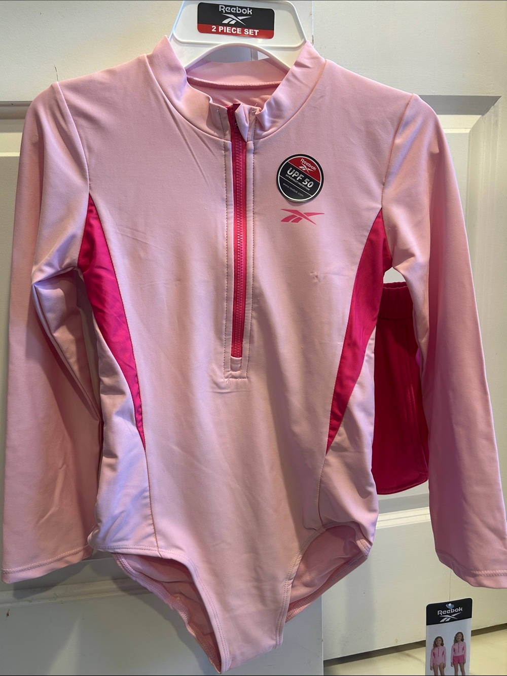 Reebok Girls' Pink Long Sleeve One-Piece with Fuchsia Panels and shorts size 8